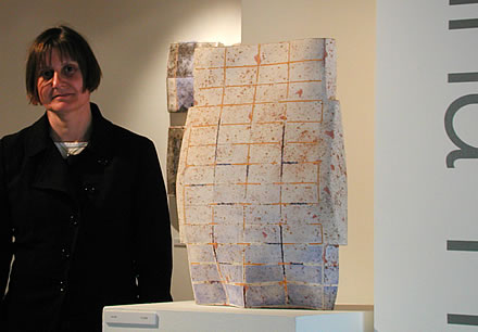 Regina Heinz with her ceramic sculpture 'Arrival'